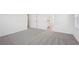Bedroom with grey carpet and en-suite bathroom at 168 Lazy Shore Dr, Nokomis, FL 34275