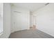 Spacious bedroom with double door closet and grey carpet at 168 Lazy Shore Dr, Nokomis, FL 34275
