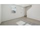 Living room with grey carpet and natural light at 168 Lazy Shore Dr, Nokomis, FL 34275