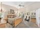 Spacious Primary bedroom with king bed and access to patio at 7319 Eleanor Cir, Sarasota, FL 34243