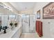 Bathroom with walk-in shower and plenty of counter space at 7319 Eleanor Cir, Sarasota, FL 34243
