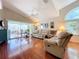 Relaxing living room with hardwood floors and access to patio at 7319 Eleanor Cir, Sarasota, FL 34243