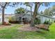 Relaxing backyard with screened patio and swing at 7319 Eleanor Cir, Sarasota, FL 34243