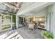 Enclosed patio with table and chairs, great for dining at 7319 Eleanor Cir, Sarasota, FL 34243