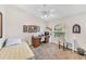 Cozy bedroom featuring a desk and window at 7319 Eleanor Cir, Sarasota, FL 34243
