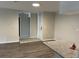 Open living space with a view into the kitchen at 624 Golden Raintree Pl # 624, Brandon, FL 33510