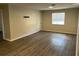 Spacious living room featuring wood-look flooring at 624 Golden Raintree Pl # 624, Brandon, FL 33510