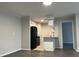 Modern kitchen with granite countertops and black appliances at 624 Golden Raintree Pl # 624, Brandon, FL 33510