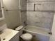 Updated bathroom with white vanity and bathtub at 624 Golden Raintree Pl # 624, Brandon, FL 33510