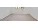 Spacious bedroom with neutral carpeting and large windows at 113 Whiteland Bnd, Nokomis, FL 34275