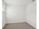 Simple bedroom with carpeted floor and window with blinds at 113 Whiteland Bnd, Nokomis, FL 34275