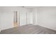 Bright bedroom with plush carpeting and access to a bathroom at 113 Whiteland Bnd, Nokomis, FL 34275