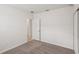 Spacious bedroom with carpet and access to hallway at 113 Whiteland Bnd, Nokomis, FL 34275