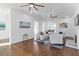 Open living area with hardwood floors, comfortable seating, and large windows at 1101 22Nd N Ave, St Petersburg, FL 33704