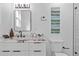 Modern bathroom with marble vanity and walk-in shower at 1101 22Nd N Ave, St Petersburg, FL 33704
