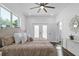 Primary bedroom with hardwood floors and access to a balcony at 1101 22Nd N Ave, St Petersburg, FL 33704