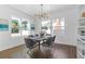 Modern dining room with hardwood floors and stylish chandelier at 1101 22Nd N Ave, St Petersburg, FL 33704