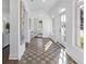 Elegant hallway with terracotta tile floors and natural light at 1101 22Nd N Ave, St Petersburg, FL 33704