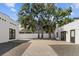 Spacious backyard with a brick walkway and gravel at 1101 22Nd N Ave, St Petersburg, FL 33704