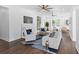 Bright living room with hardwood floors, fireplace and ceiling fan at 1101 22Nd N Ave, St Petersburg, FL 33704