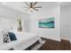 Spacious bedroom featuring hardwood floors and a ceiling fan at 1101 22Nd N Ave, St Petersburg, FL 33704