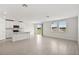 Modern kitchen with white cabinets and stainless steel appliances at 164 Lazy Shore Dr, Nokomis, FL 34275