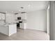 Modern kitchen with stainless steel appliances and white cabinetry at 164 Lazy Shore Dr, Nokomis, FL 34275