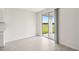 Bright dining room with sliding glass doors to a patio at 164 Lazy Shore Dr, Nokomis, FL 34275