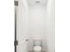 Small, simple bathroom with a toilet and white walls at 188 Lazy Shore Dr, Nokomis, FL 34275