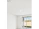 Room with sliding glass doors leading to backyard at 188 Lazy Shore Dr, Nokomis, FL 34275