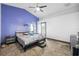 Spacious bedroom with vaulted ceilings, ceiling fan, and tiled floors at 7940 Fashion Loop, New Port Richey, FL 34654