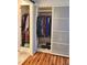 Well-organized closet with double hanging rods and shelving at 751 Nantucket Rd, Venice, FL 34293
