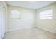 Empty bedroom with closet and window with blinds at 11357 116Th Ave, Largo, FL 33778