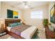 Cozy bedroom with modern decor, wood furniture, and neutral color palette at 11357 116Th Ave, Largo, FL 33778