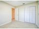 Bedroom with double closet and access to hallway at 11357 116Th Ave, Largo, FL 33778
