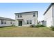 This grassy backyard offers a blank slate ready to customize to your preferences at 3910 Radiant Mountain Dr, Plant City, FL 33565