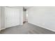 Bright bedroom with closet; view of the entrance from the bedroom at 3910 Radiant Mountain Dr, Plant City, FL 33565