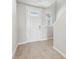 Entryway with a white front door and neutral tile flooring at 3910 Radiant Mountain Dr, Plant City, FL 33565