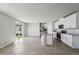 A spacious, open-concept kitchen and living room area provides ample natural light at 3910 Radiant Mountain Dr, Plant City, FL 33565