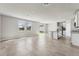 Open concept living room featuring tile flooring and a view of the kitchen at 3910 Radiant Mountain Dr, Plant City, FL 33565