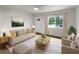 Bright living room featuring a comfy sofa and stylish coffee table at 2585 15Th N Ave, St Petersburg, FL 33713
