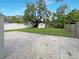 Large backyard with storage shed and concrete patio at 2585 15Th N Ave, St Petersburg, FL 33713