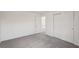 A standard bedroom featuring neutral carpeting and a closet at 14033 Crutchfield Ct, Parrish, FL 34219