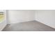 A basic bedroom featuring neutral carpet and a view from the window at 14033 Crutchfield Ct, Parrish, FL 34219