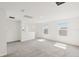 Spacious loft with neutral walls, carpet flooring, and ample natural light from several windows at 14033 Crutchfield Ct, Parrish, FL 34219