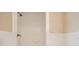 Simple shower with white tile and updated fixtures at 6445 Skyline Ct, Spring Hill, FL 34606