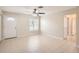 Bright living room with tile floors and neutral walls at 6445 Skyline Ct, Spring Hill, FL 34606