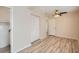 Bright bedroom with wood-look floors and ample closet space at 6445 Skyline Ct, Spring Hill, FL 34606