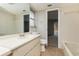 Clean bathroom with a vanity, toilet, and bathtub at 8018 Idle Briar Ln, Port Richey, FL 34668