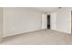 Spacious bedroom with plush carpeting and ample natural light at 8018 Idle Briar Ln, Port Richey, FL 34668
